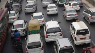 Cars on the road in Delhi