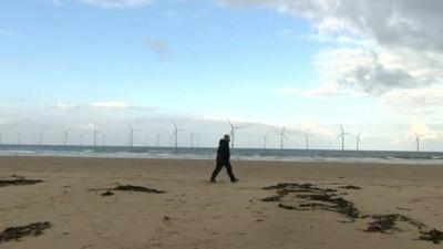 Ken McGlasson SSI Steel worker on beach