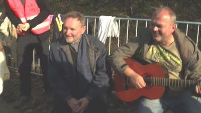 Guitarist on the border crossing between Serbia and Croatia