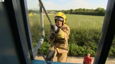 Firefighter climbing