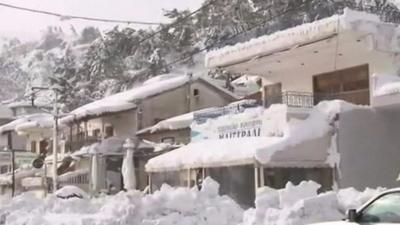 Parts of Greece have been blanketed in snow as icy temperatures continue to grip much of Europe.