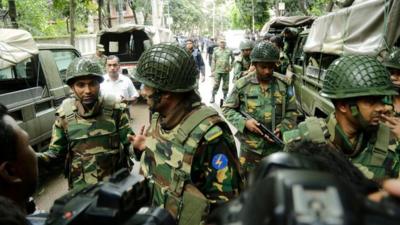 Army soldiers in the street close to the Holey Artisan Bakery in Dhaka, Bangladesh 02 July 2016