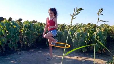 Girl hula-hooping