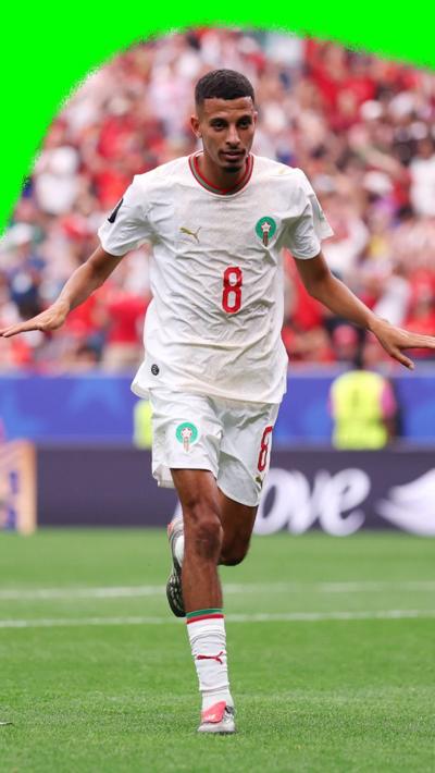 Azzedine Ounahi runs to the crowd to celebrate after scoring a second goal for Morocco in the 2026 World Cup