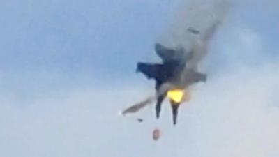 Two fighter jets collide mid-air