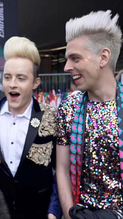 One of Jedward with a fan sporting similar bleached quiff hair style