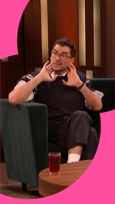 Daniel Levy clutching his neck