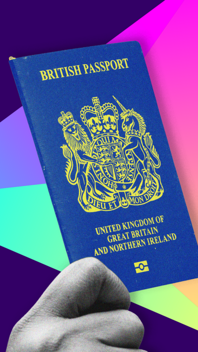 A hand holds a blue British passport over a purple background with a multi-coloured pyramid.
