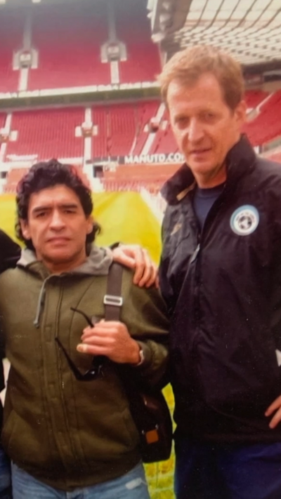 Old photo of Maradona and Alastair Campbell at Old Trafford.