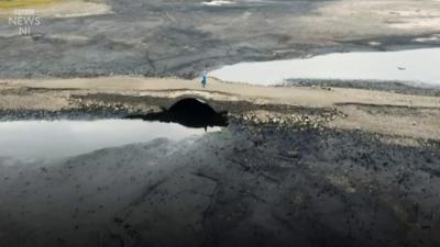 Water supplies have dropped in Spelga Reservoir revealing what lies beneath