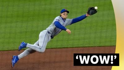 Brett Baty of the New York Mets takes a diving catch