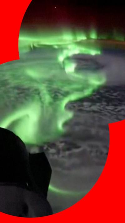 Green lights seen over Earth from space