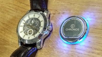 Chronos pad next to a watch