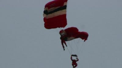 Parachutists entangled