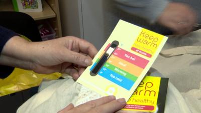 Warm packs funded by the Public Health Agency are being handed out at a nursery in Bangor, County Down, to help families struggling to heat their homes this winter.