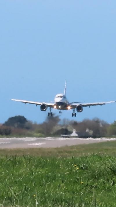 An Airbus A319 landing at Guernsey Airport