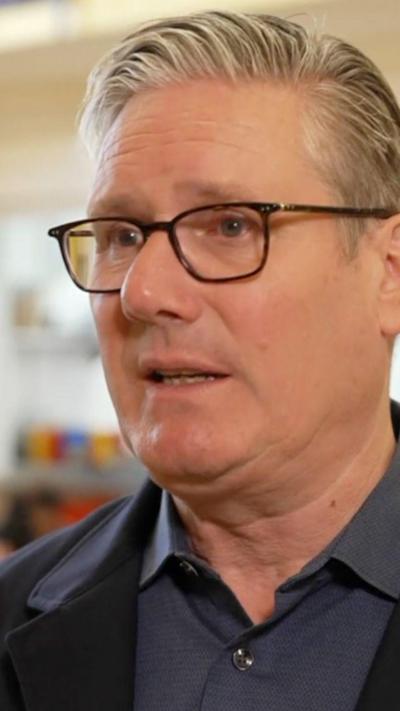 PM Keir Starmer pictured wearing glasses