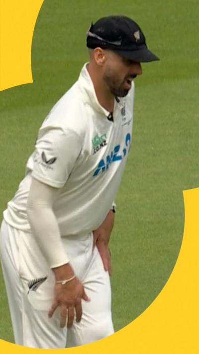 Daryl Mitchell reacts to ball hitting him in the knee at day four of England v New Zealand in the men's Test match series