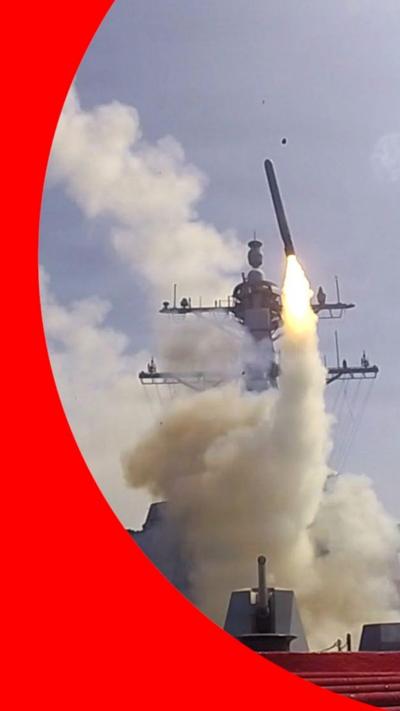 A missile launches from a warship during Operation Epic Fury.
