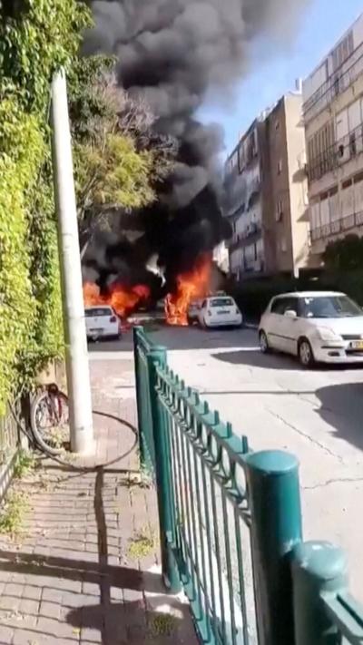 Burning cars on a street