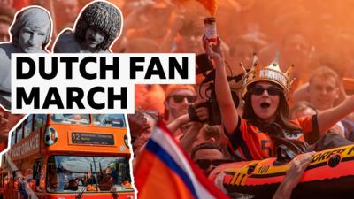 Dutch fan in dinghy celebrates