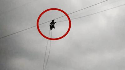 Person laying new cable line in Pakistan