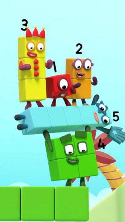 A screengrab of an episode of Numberblocks. Shows various different coloured square animated characters in yellow, blue, green, red and orange.