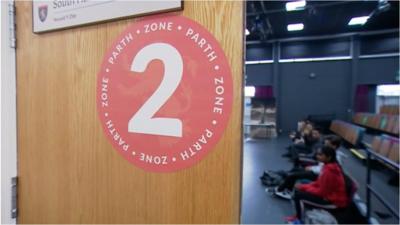 Door showing zone area number in Olchfa school