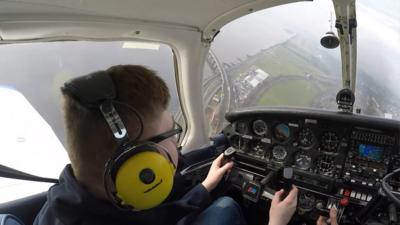 Teenager Kyle flying a plane