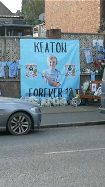 A sky blue banner reading Keaton Forever 12 at the scene of a fatal road crash
