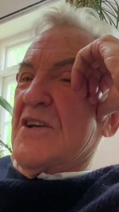 Larry Lamb in his living room