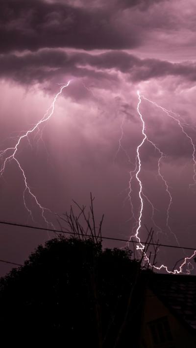 Lightning strikes against a stormy background