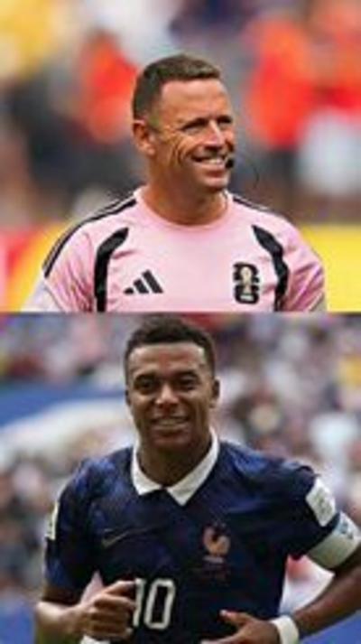 Stuart Burt and Kylian Mbappe