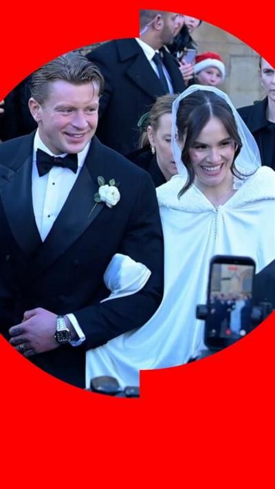 Adam Peaty in a suit and bow tie beside Holly Ramsay in white wedding dress