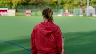 hockey player from the back