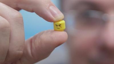 Holding a Lego head