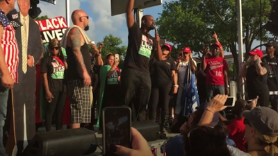 Black Lives Matter activist speaking at Trump rally.