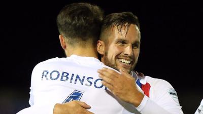 Josh Robinson celebrates with Andrew Waterworth