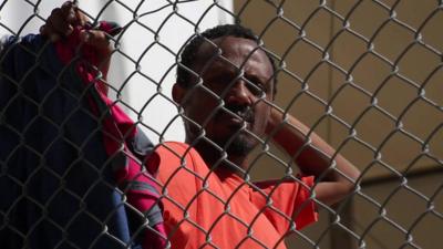 A man at the migrant camp at Moria