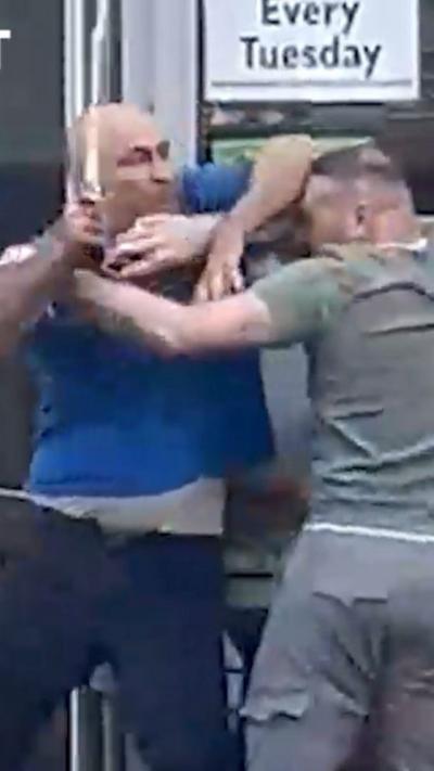 A screengrab of people in a fight