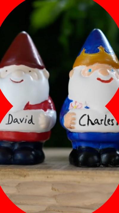 Four garden gnomes with Sir David, Charles III, Frances and Alan written on them.