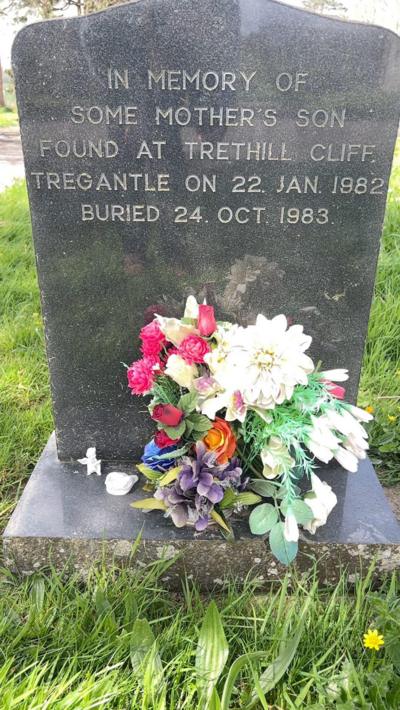 A gravestone which says "In memory of some mother's son found at Trethill cliff Tregantle on 22 Jan 1982"
