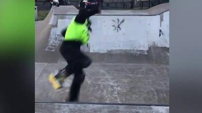 Skateboarding police officer