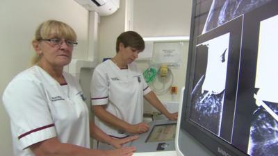 Nurses checking cancer images