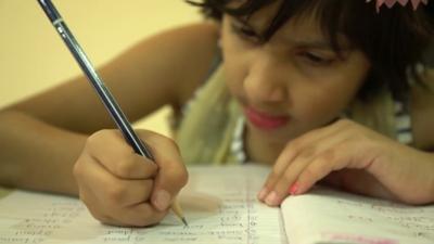 A child studying in India