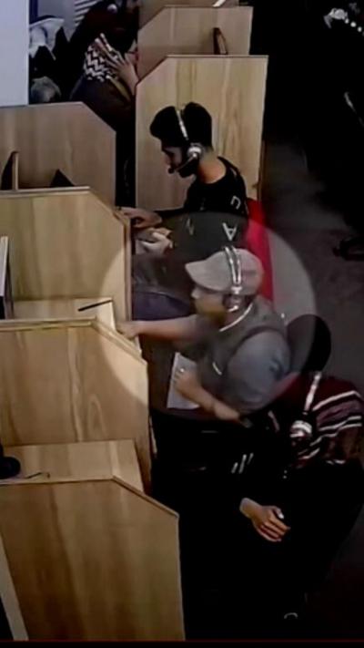 Image of man in call centre highlighted