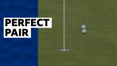 Two balls side-by-side on the green