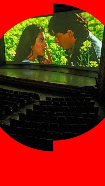 An iconic scene during the screening of the popular Bollywood Hindi film 'Dilwale Dulhania Le Jayenge' at Maratha Mandir theatre in Mumbai, on October 17, 2025