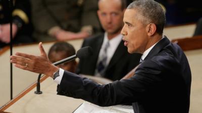 U.S. President Barack Obama gestures as he delivers the State of the Union speech in the House chamber of the U.S. Capitol January 12, 2016 in Washington, DC.