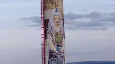 The chimney painted by a robot spray painter